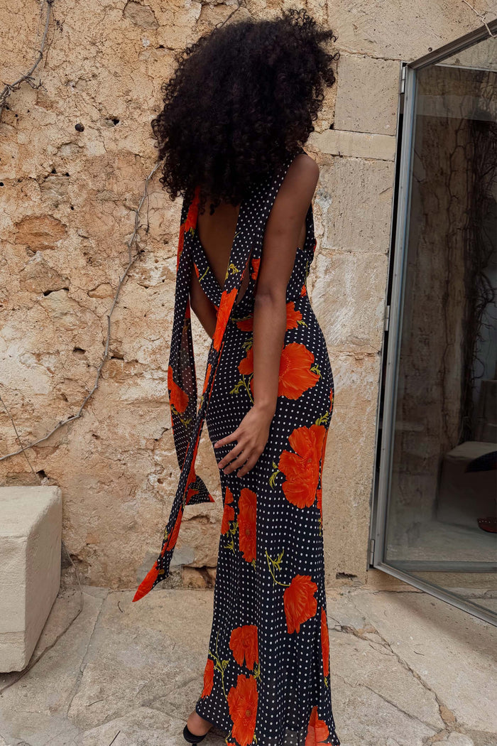 Black Poppy Sophie Dress featuring a low back and multi-wear scarf in a polka dot and poppy print.