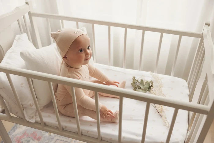footie pointelle bebe - shell pink