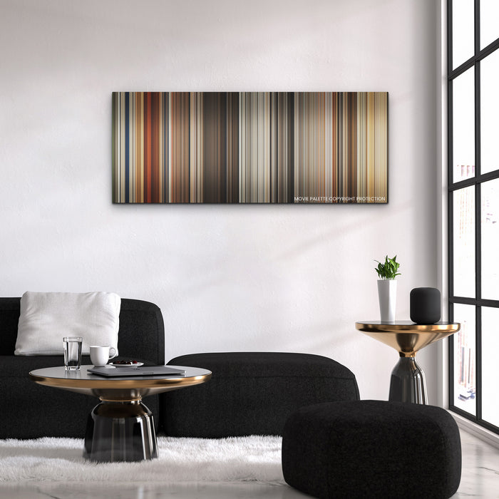 Furiosa: A Mad Max Saga color palette canvas above a black sofa with a gold-topped table