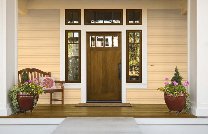 Retique It Wood'n Finish Kit Large in Dark Pecan, showing the front door with a realistic wood grain finish.