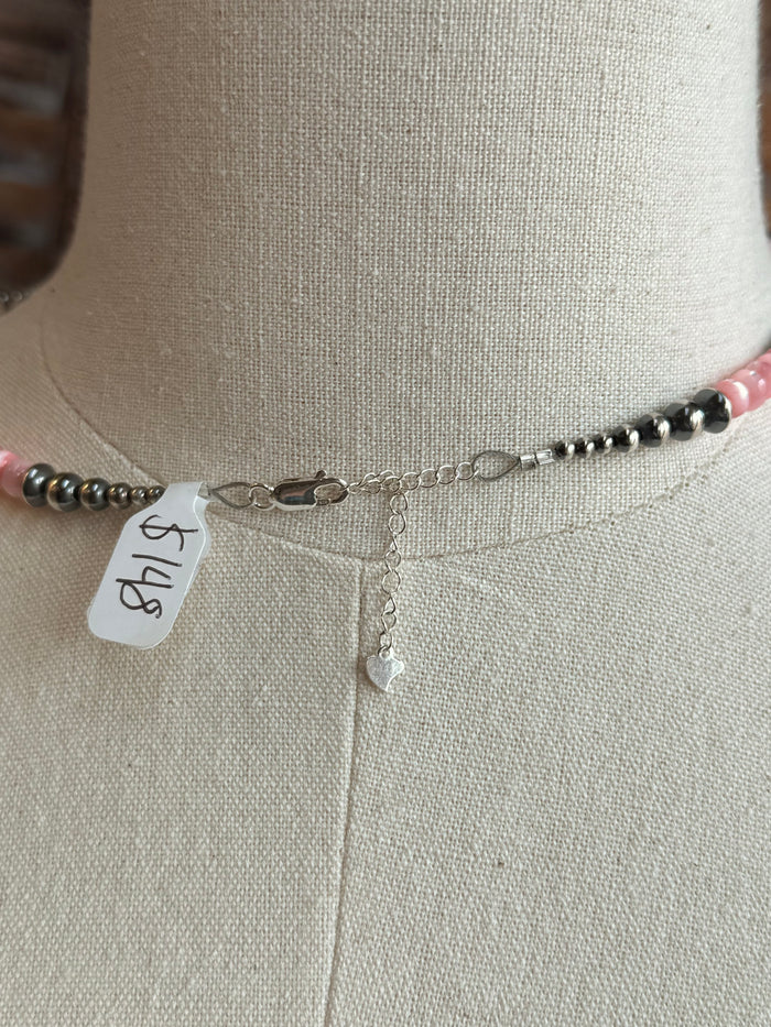 Pink mother-of-pearl sterling necklace clasp with extender chain and small charm tag