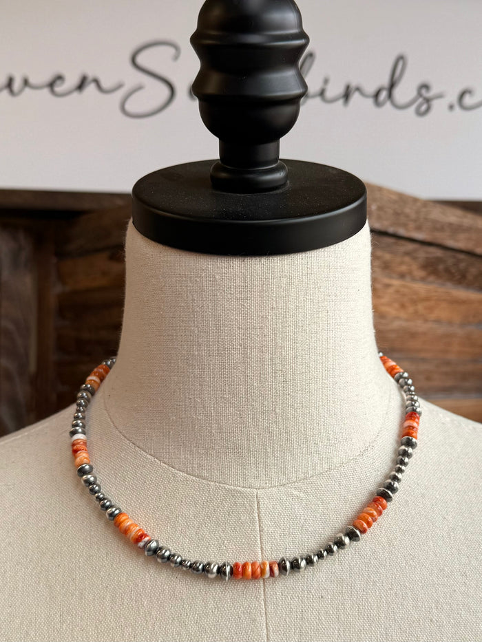 Orange spiny sterling necklace with alternating orange and silver bead sections