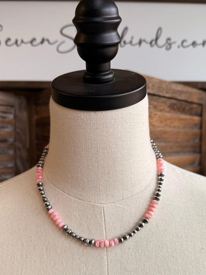 Pink mother-of-pearl sterling bead necklace with pink and silver-tone beads, front view