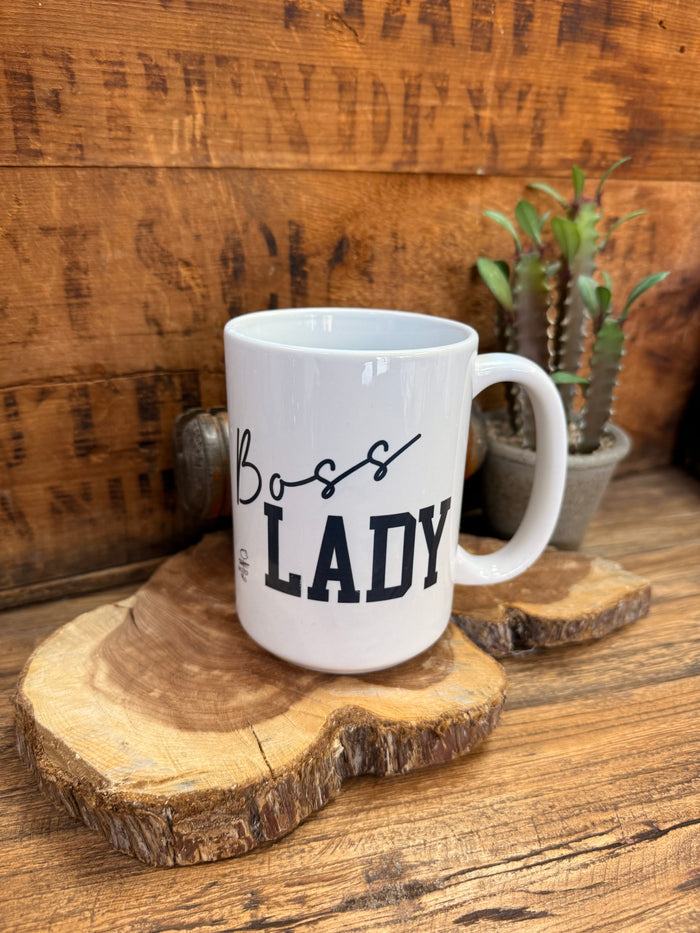 White ceramic mug with "Boss" and "LADY" text and black handle
