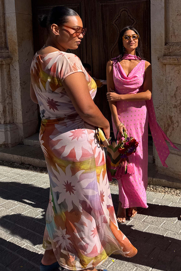 Abstract Soleil Luna Mesh Dress with multicoloured sun motifs and iconic prints on a curvy model.