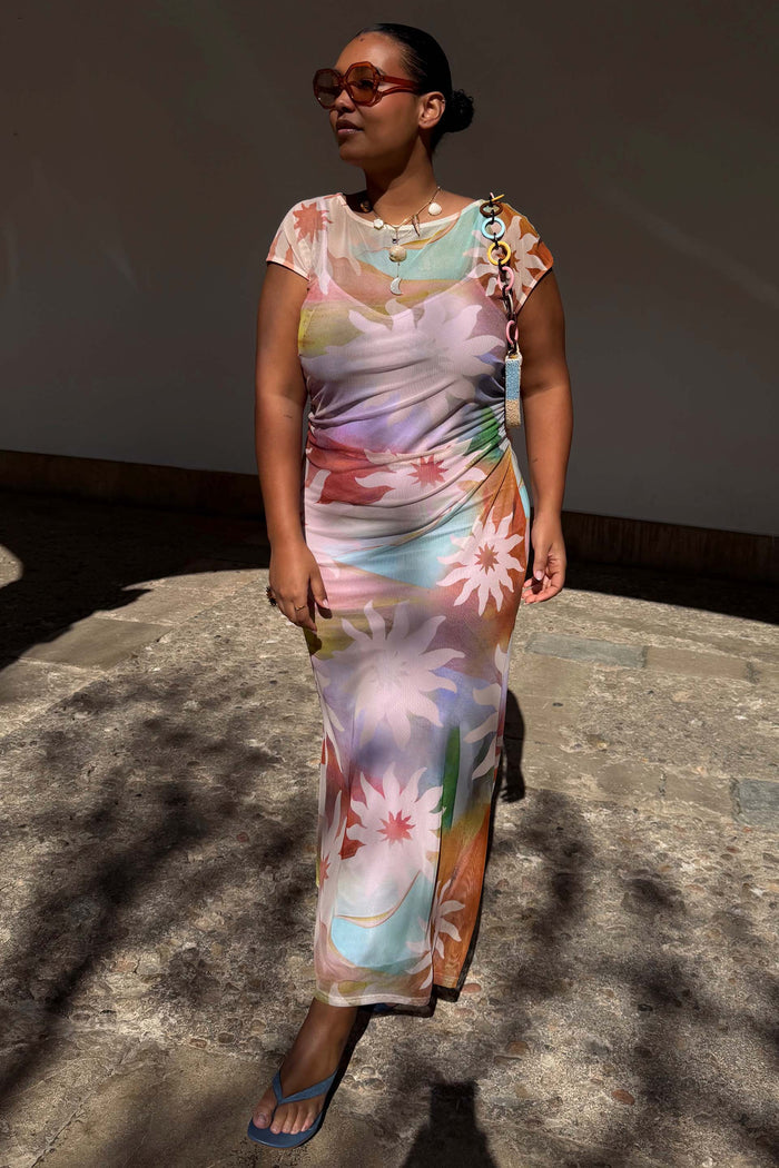 Abstract Soleil Luna Mesh Dress in a multicoloured soleil print mesh, shown on a model for a vacation look.