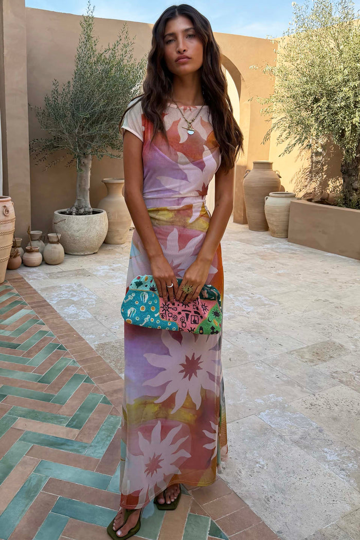 Abstract Soleil Luna Mesh Dress featuring multicoloured sun motifs on sheer mesh with short sleeves.