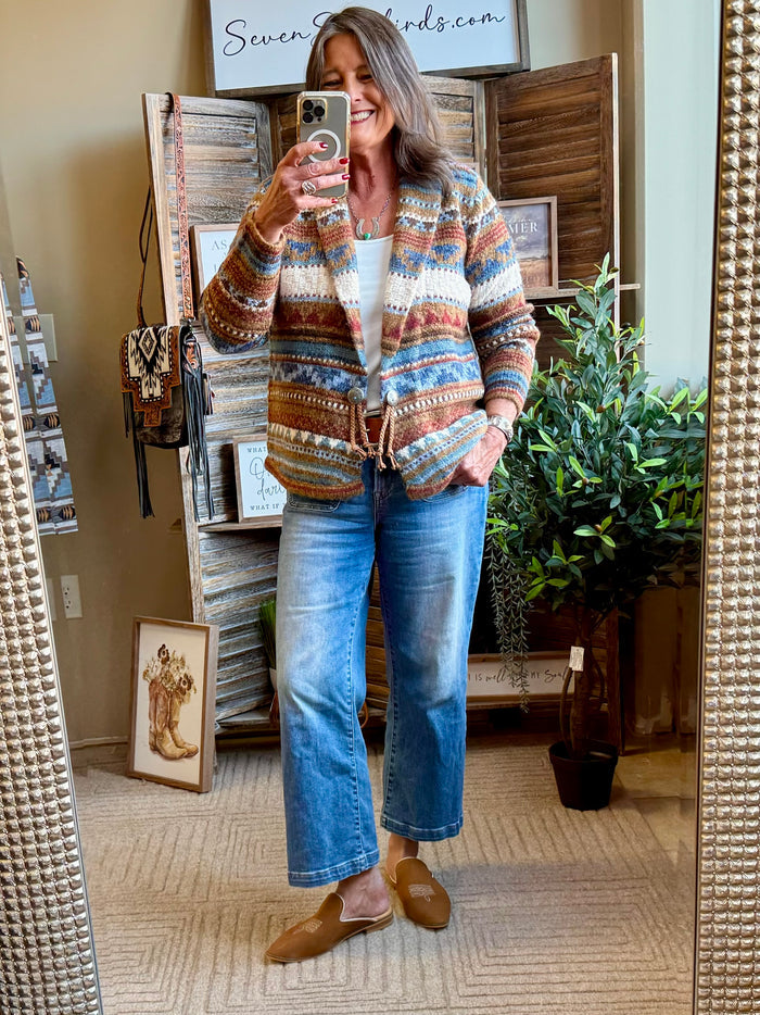 Aztec cardigan full view: multicolor geometric knit, button front, long sleeves
