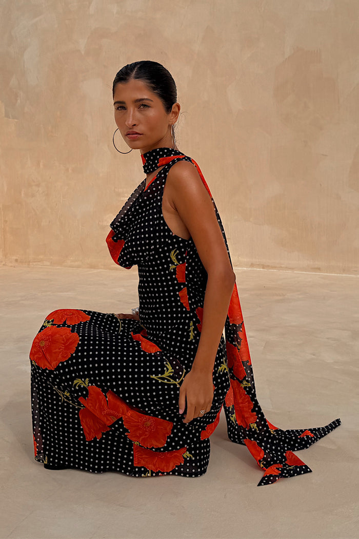 Petite Black Poppy Sophie Dress with a polka dot and red poppy print featuring a trailing scarf.