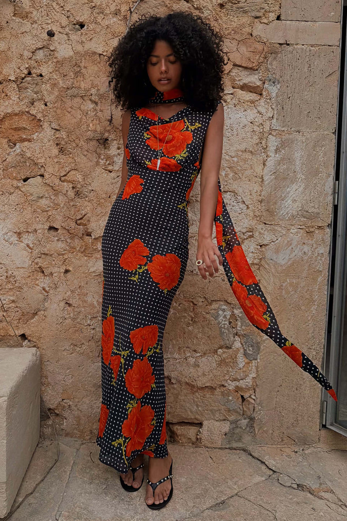 Black Poppy Sophie Dress with polka dots, orange poppies, cowl neckline and matching multi-wear scarf detail.