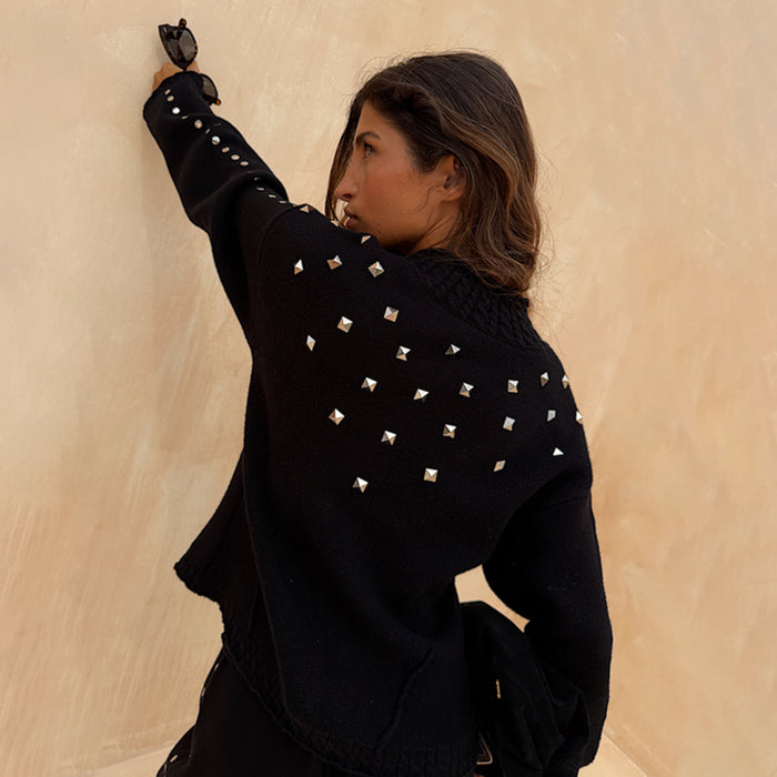 Black Studded Cardigan with silver metal square studs on the back and sleeves, featuring a structured knit.