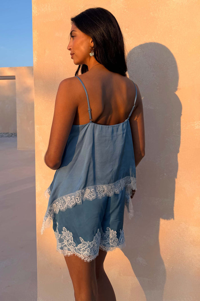 Blue Lace Swing Cami with a satin-feel finish and white lace trim, designed in London as a matching vacation co-ord.