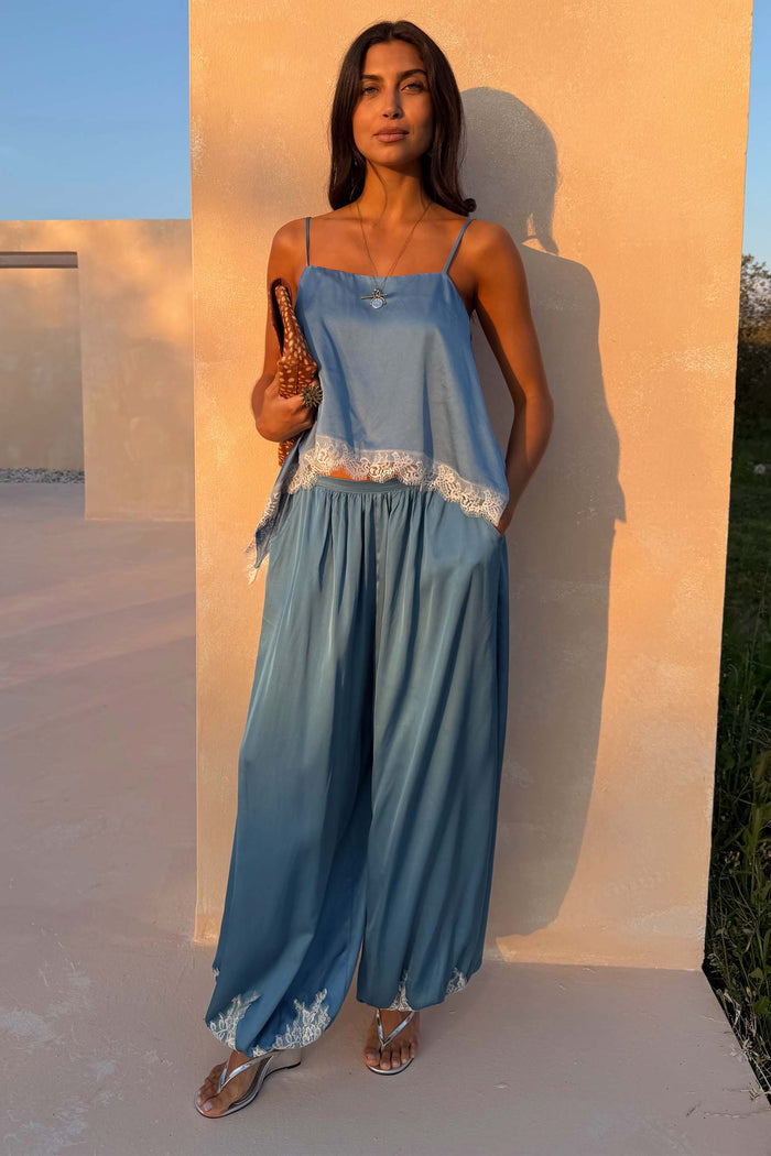 Blue Lace Swing Cami with a satin-esque base and white lace-trimmed hem, styled as a summer co-ord.