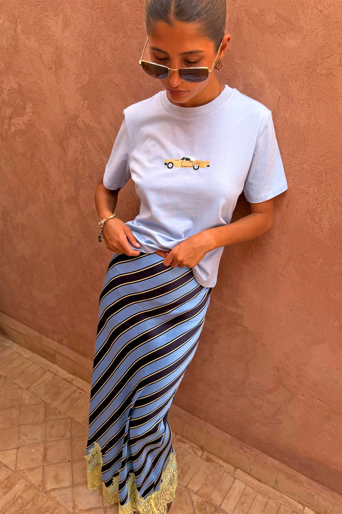 Cadillac Baby T-Shirt in blue cotton with a retro car motif, styled with a striped slip skirt.