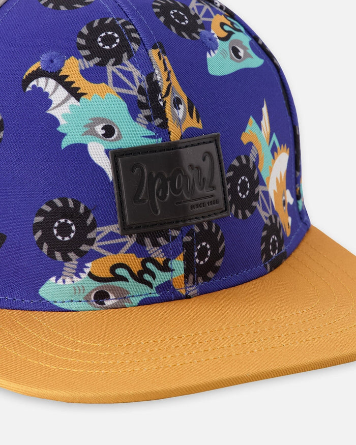 Deux par Deux boys' blue monster truck print flat-brim cap – close-up of the logo patch and print