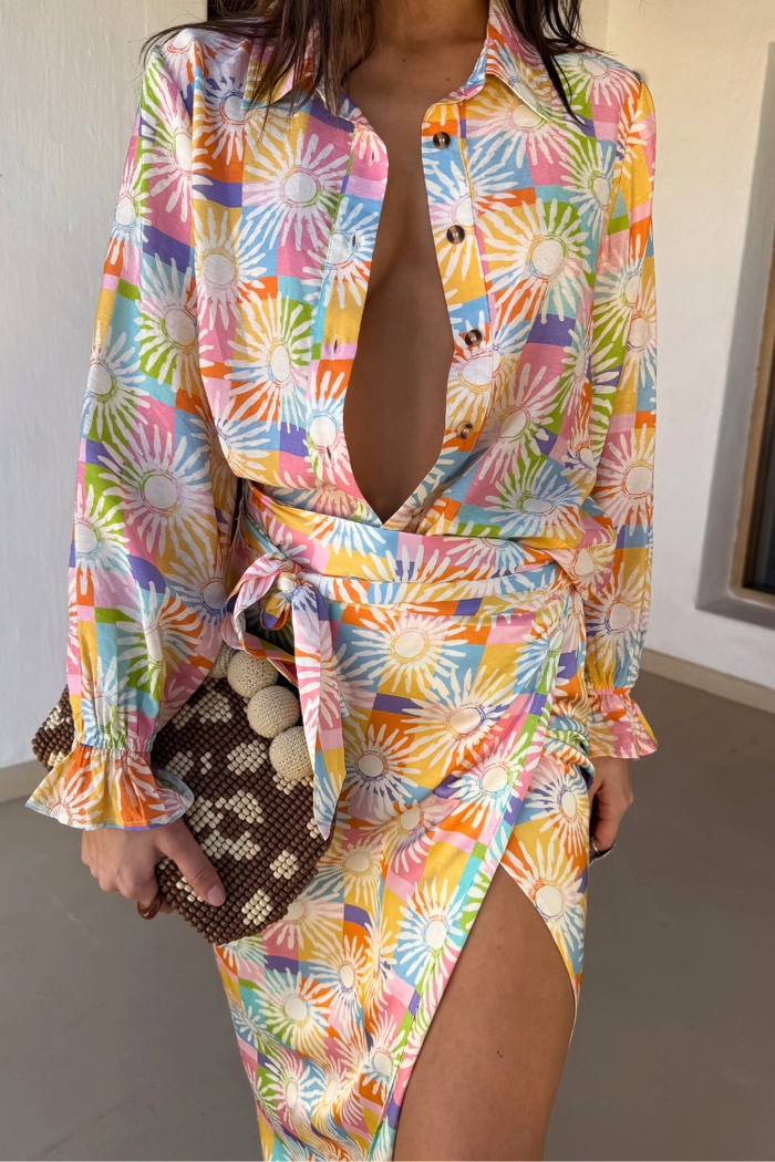 Check Sun Jaspre wrap skirt with sun motifs, styled as a colourful co-ord with the matching shirt.