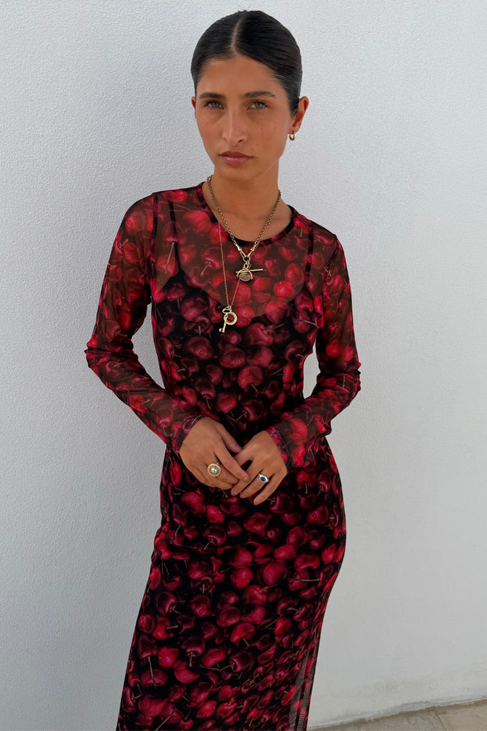 Cherry Mesh Soho Dress with a red digital cherry print and long sleeves in sheer mesh fabric.