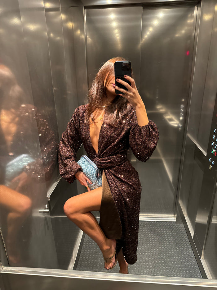 Chocolate Sequin Vienna Dress with voluminous sleeves and multi-wear wrap waist, shown in a lift mirror selfie.