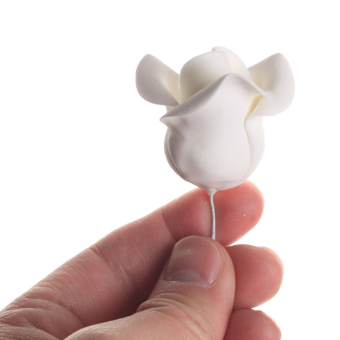 White Gumpaste Roses handmade sugar cake decorations and cake toppers perfect for cake decorating rolled fondant wedding cakes and fondant birthday cakes. Wholesale sugar flowers and cake supply. Caljava