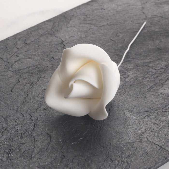 White Gumpaste Roses handmade sugar cake decorations and cake toppers perfect for cake decorating rolled fondant wedding cakes and fondant birthday cakes. Wholesale sugar flowers and cake supply. Caljava