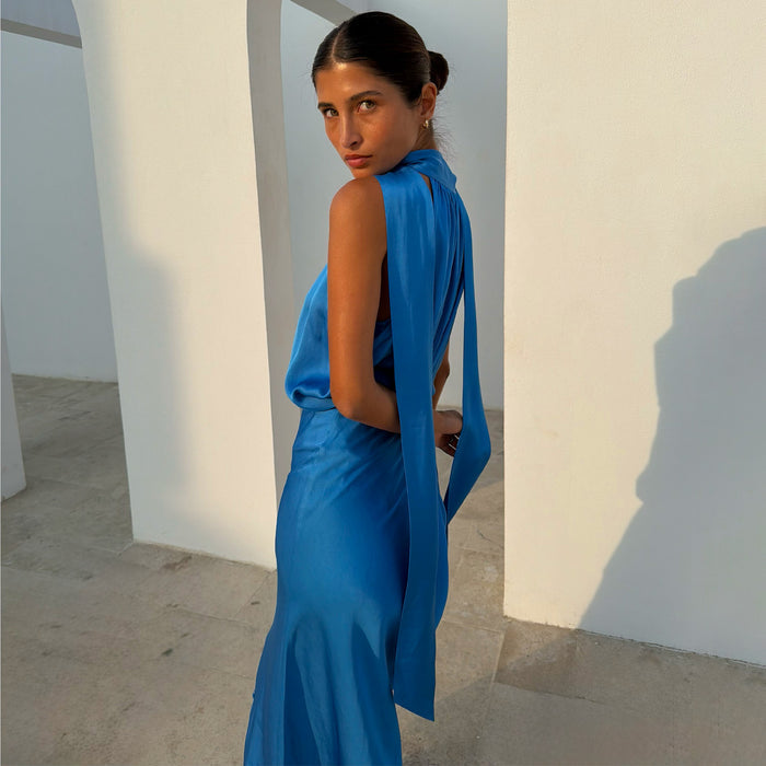 Cobalt Lily Top in a blue satin-esque fabric with long multi-wear tie neck straps and a matching skirt.