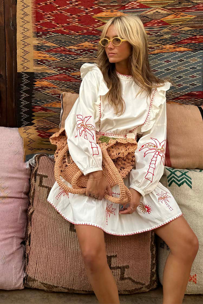 Cream Pollenca Mini Dress in cotton with red palm tree embroidery and ruffles from the NFD X Caetana range.