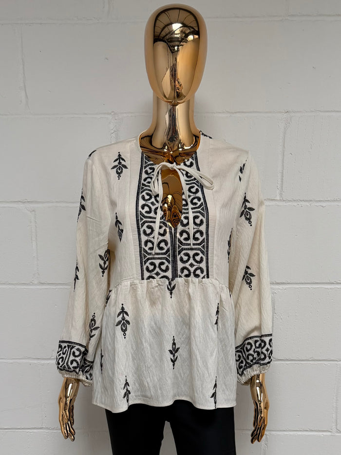 Cream Peplum Tie Up Top With Black Detailing