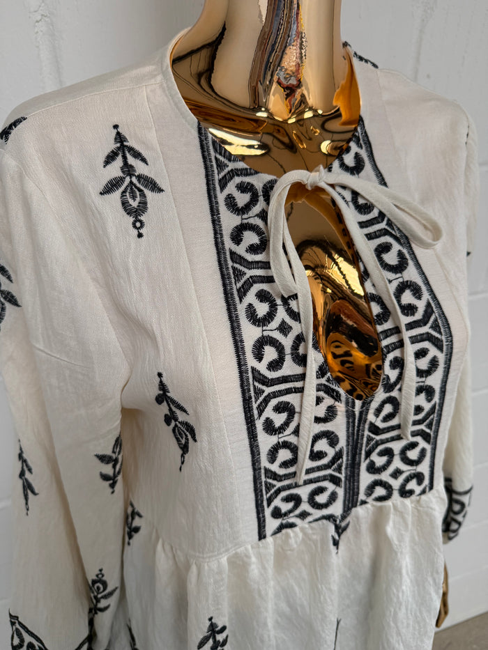 Cream Peplum Tie Up Top With Black Detailing