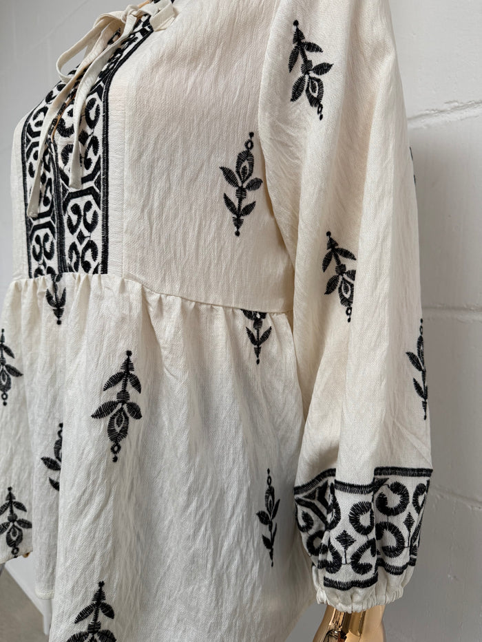 Cream Peplum Tie Up Top With Black Detailing