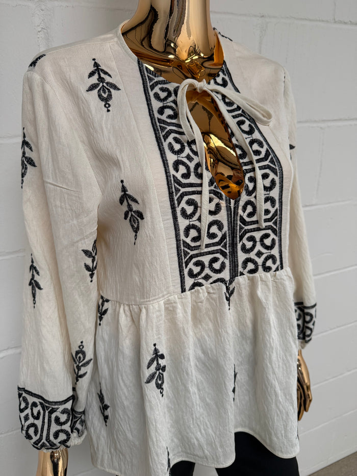 Cream Peplum Tie Up Top With Black Detailing