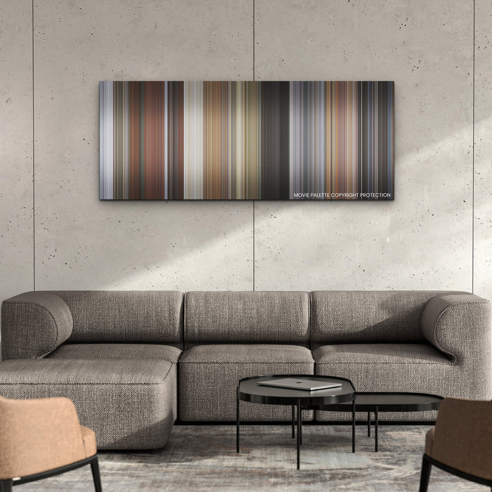 Deadpool & Wolverine color palette canvas on a concrete wall above a gray sectional sofa