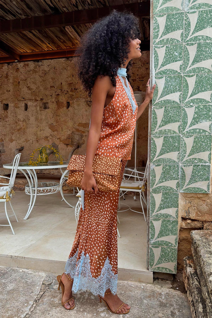 Fawn print Maeva midi skirt with a blue lace border, paired with a matching halter top co-ord.