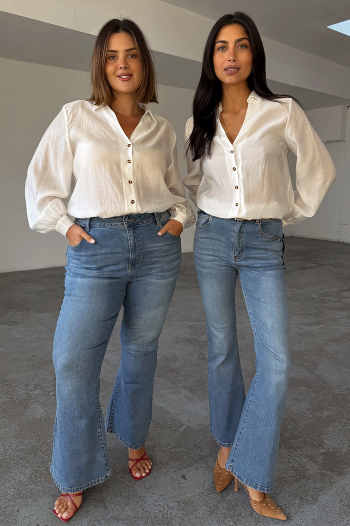 Blue Denim Flare Scallop Jeans with a 70s silhouette, shown on two models for inclusive sizing.