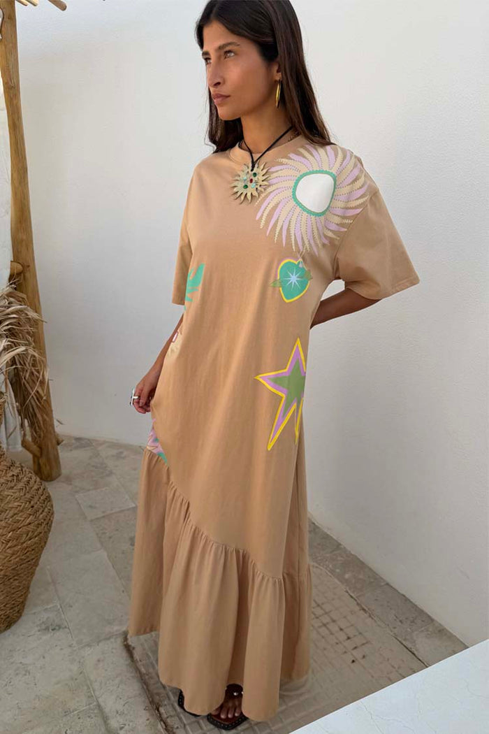 Brown Dreamer T-Shirt Dress with colourful sun and star prints and an asymmetric gathered skirt.