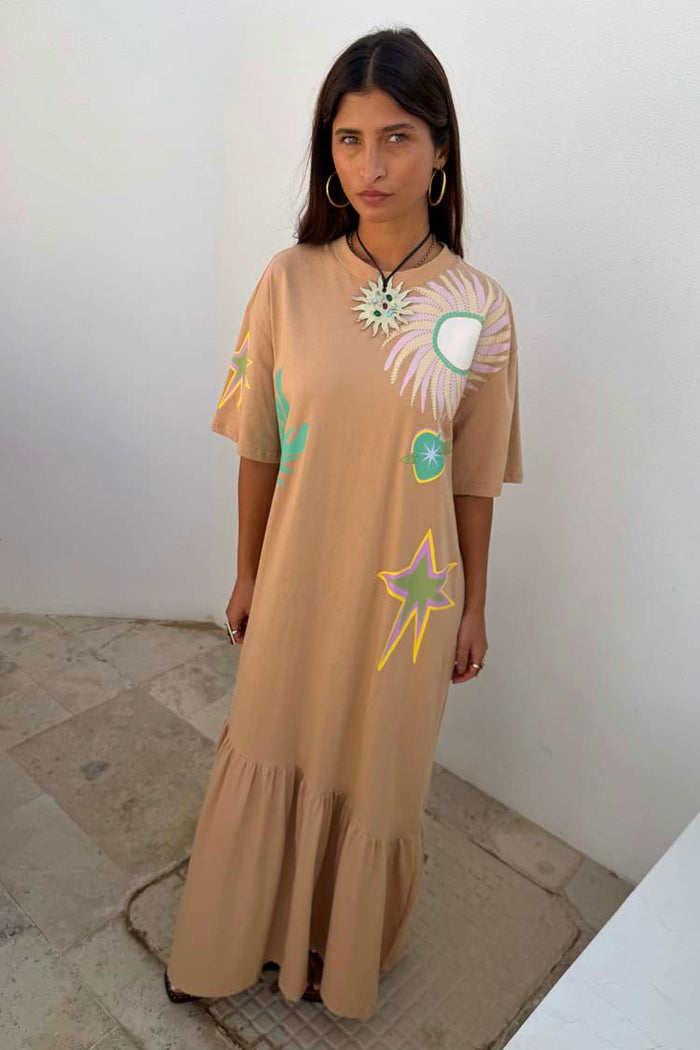 Oversized brown cotton Dreamer T-Shirt Dress with colourful sun motifs and a gathered asymmetric skirt.