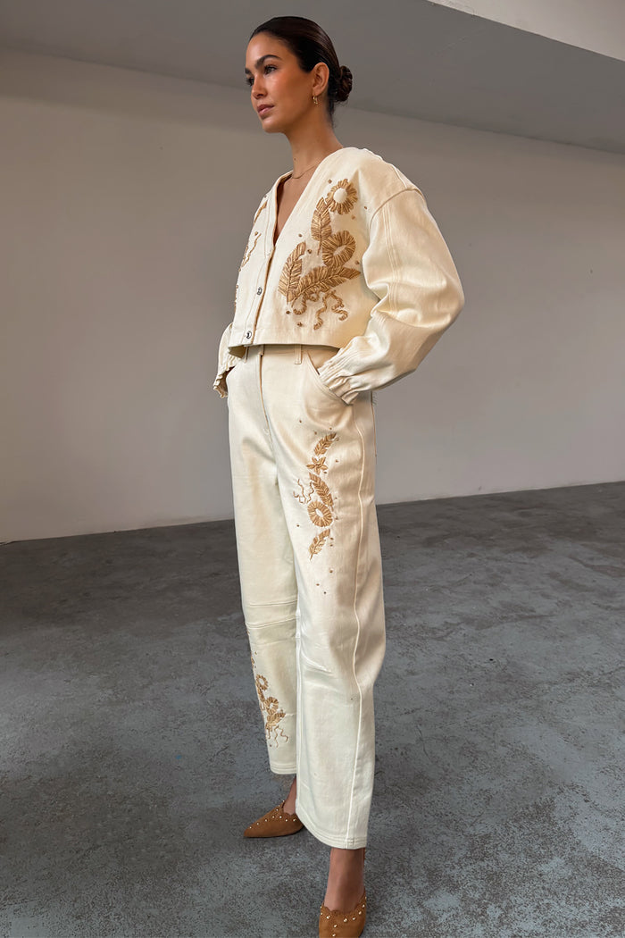 Ecru Raffia Palma barrel leg jeans with textured floral embroidery, styled as a co-ord with a matching jacket.