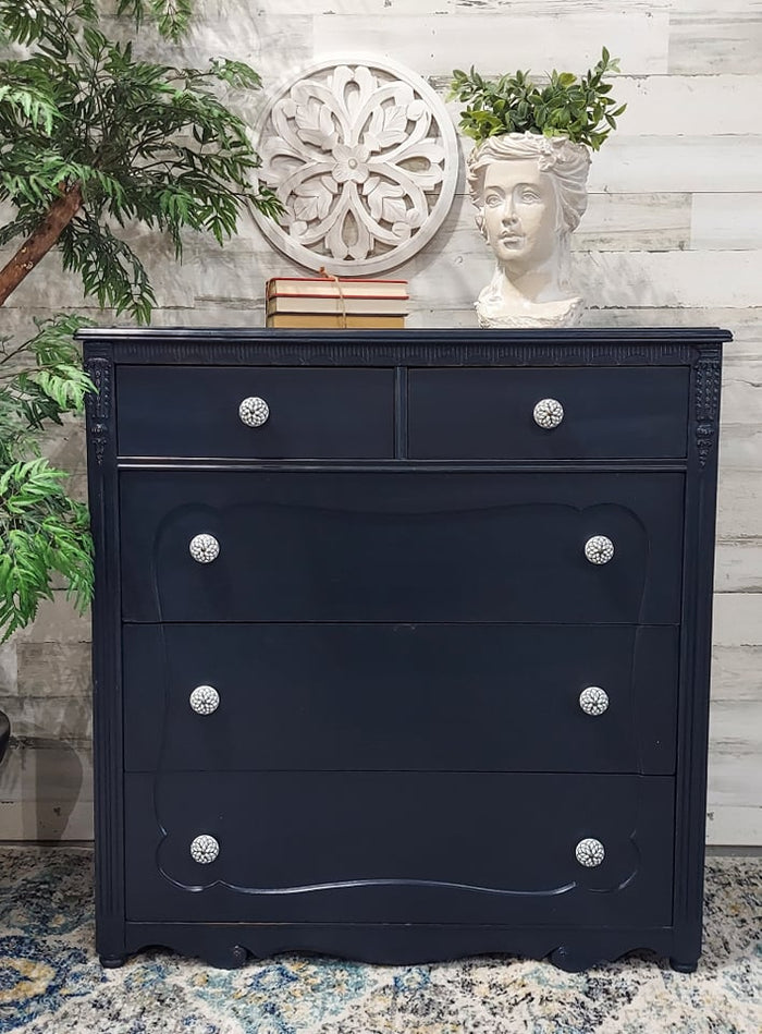 Retique It Twilight furniture and cabinet paint in a quart container, ready for home renovation projects.