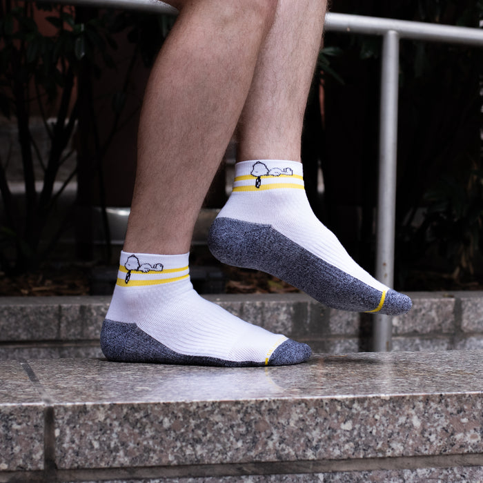 White and black marled quarter compression socks for men with a Good Grief design, shown from the front.