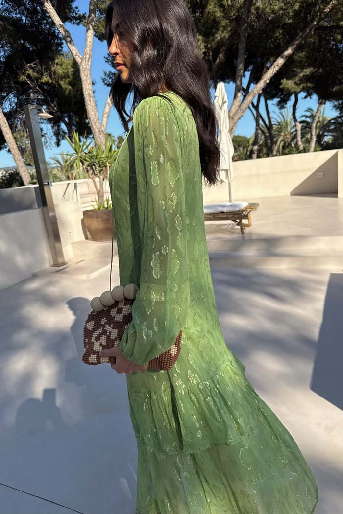 Green Jacquard Harmony Dress Petite in olive with gold animal print, tiered pleated skirt and long sleeves.