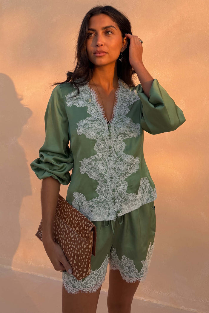 Green Lace Romi Top in soft green satin with contrast lace, button-up front and long voluminous sleeves.