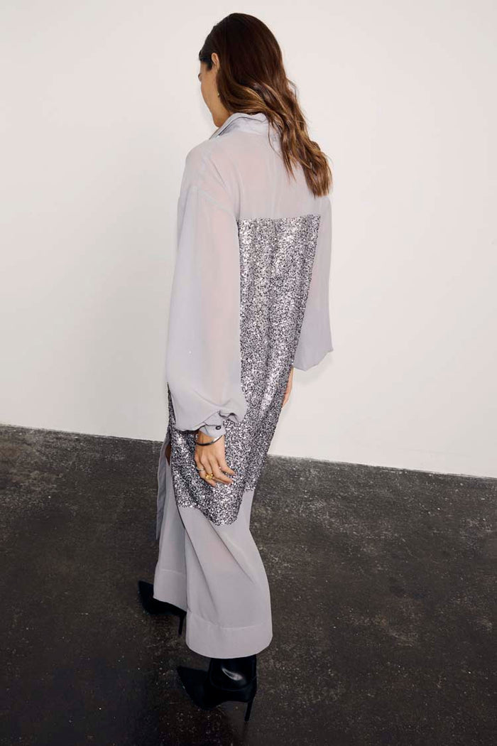 Gunmetal Sequin Lila Shirt Dress in grey, featuring a shimmering sequin back panel and relaxed longline silhouette.