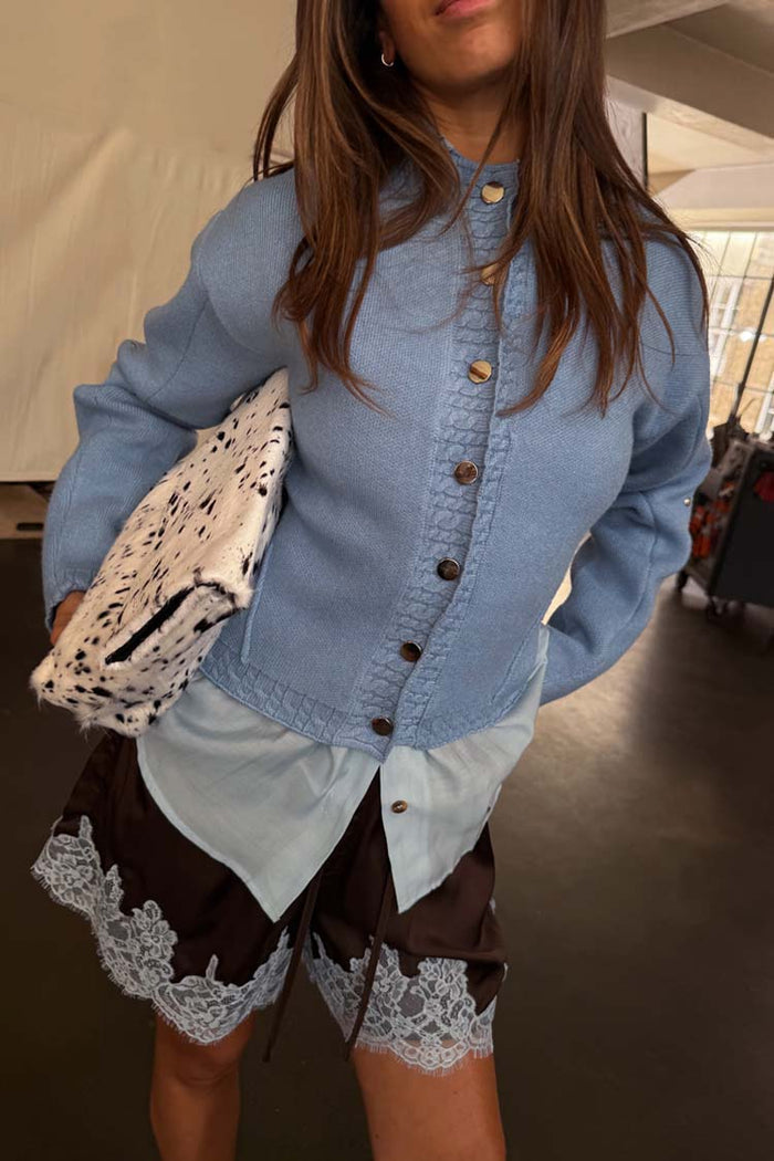 Ice Blue Studded Cardigan with silver buttons, styled with a light blue shirt and lace-trim shorts.
