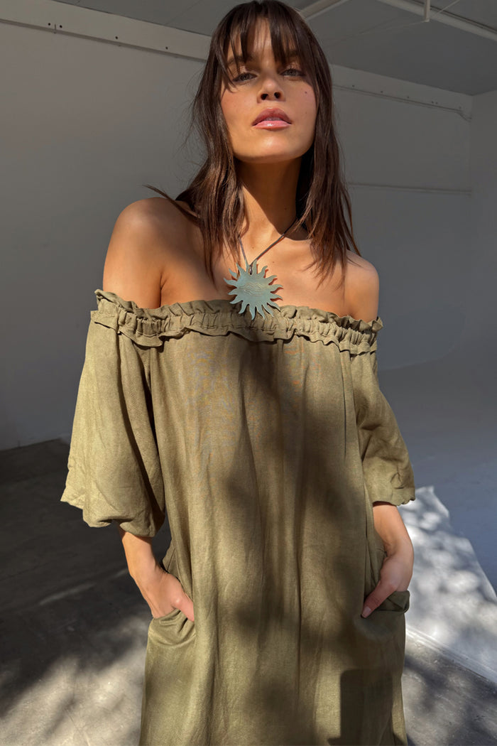 Khaki Ella Dress in a linen blend featuring a ruffled off-shoulder neckline and side pockets.