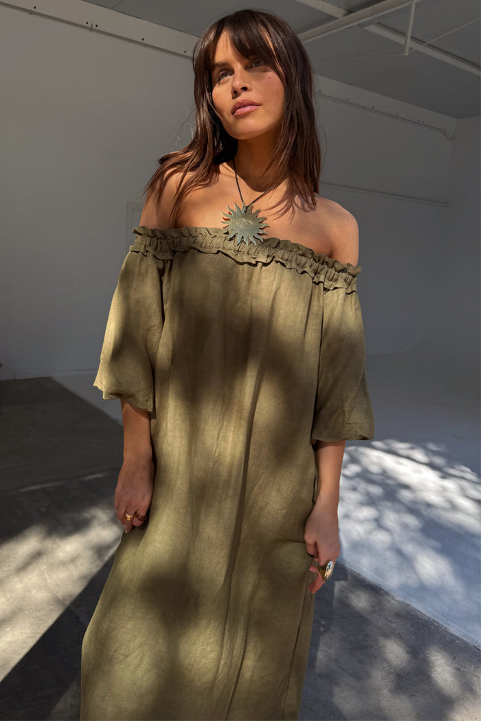 Khaki Ella Dress in a green linen blend with a ruffled multi-wear neckline and off-shoulder styling.