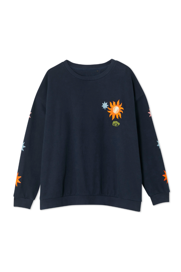 Navy Charm Sweatshirt with colourful sun, star and eye motifs, featuring a relaxed fit and dropped shoulders.