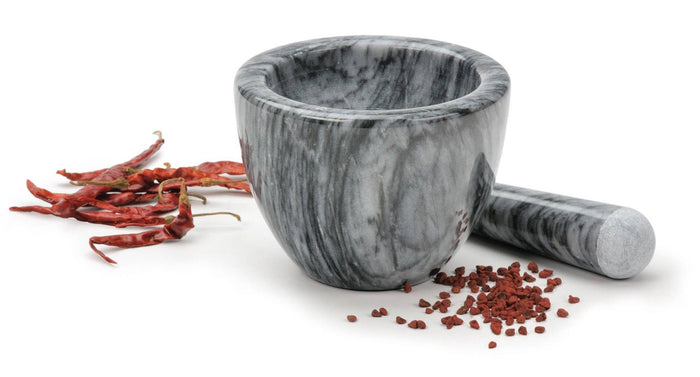 RSVP International marble mortar and pestle set for grinding herbs and spices, featuring a smooth white marble finish.