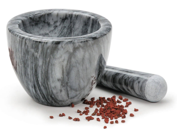 Marble mortar and pestle from RSVP International, showing a close-up of the smooth white marble bowl and pestle used for grinding.