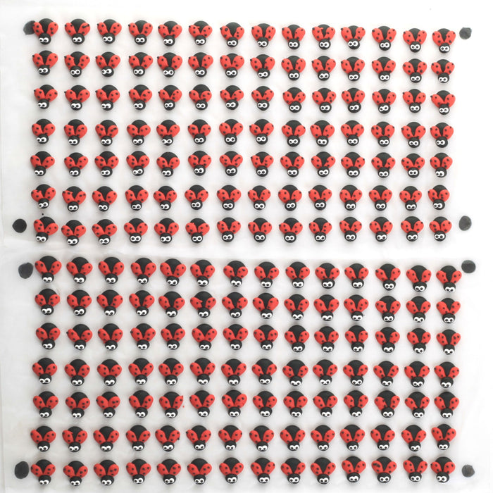 Lady Bug Royal Icing Topper great for decorating your own chocolates, candy, cookies, cake, cupcakes, and more. Hand piped of edible royal icing, safely packed and ready to use out of the box.  Kosher. Caljava