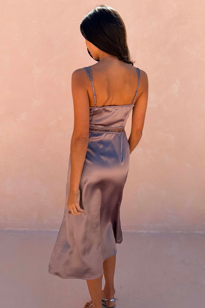 Mink Mimi Dress Petite in mink grey satin with lace trims on the straps and waist, shown from the back.