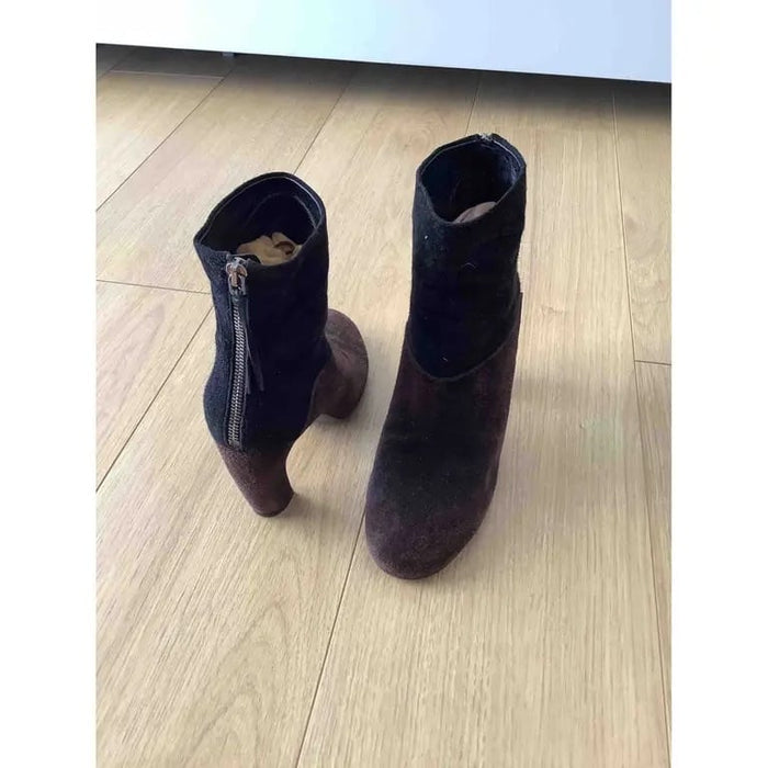 sc:https://old.stylecycle.gr/media/catalog/product/b/l/black-suede-miu-miu-boots-41549484-2_2_1.jpg